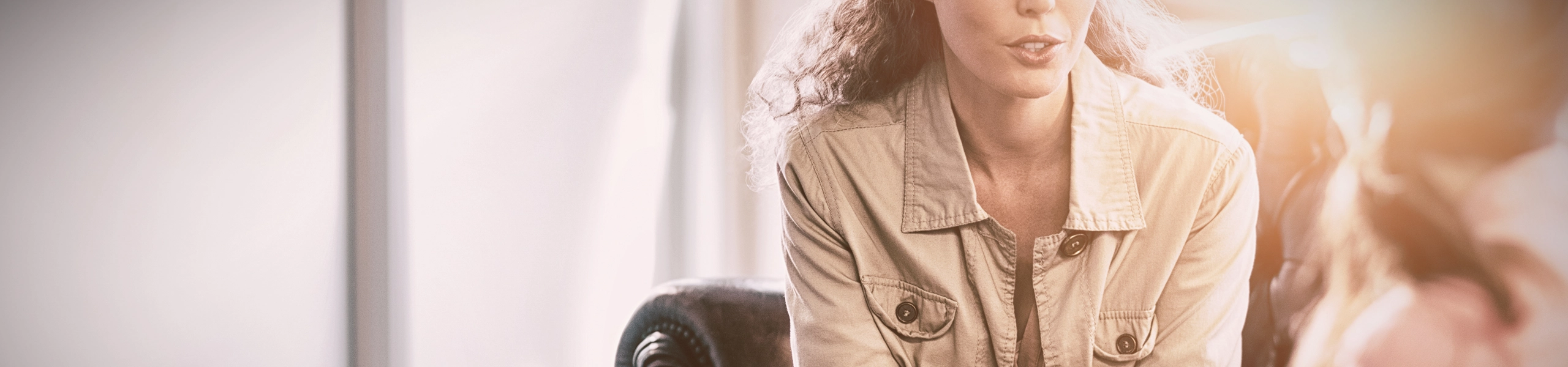 Individual discussing their online therapy options with their online therapist.